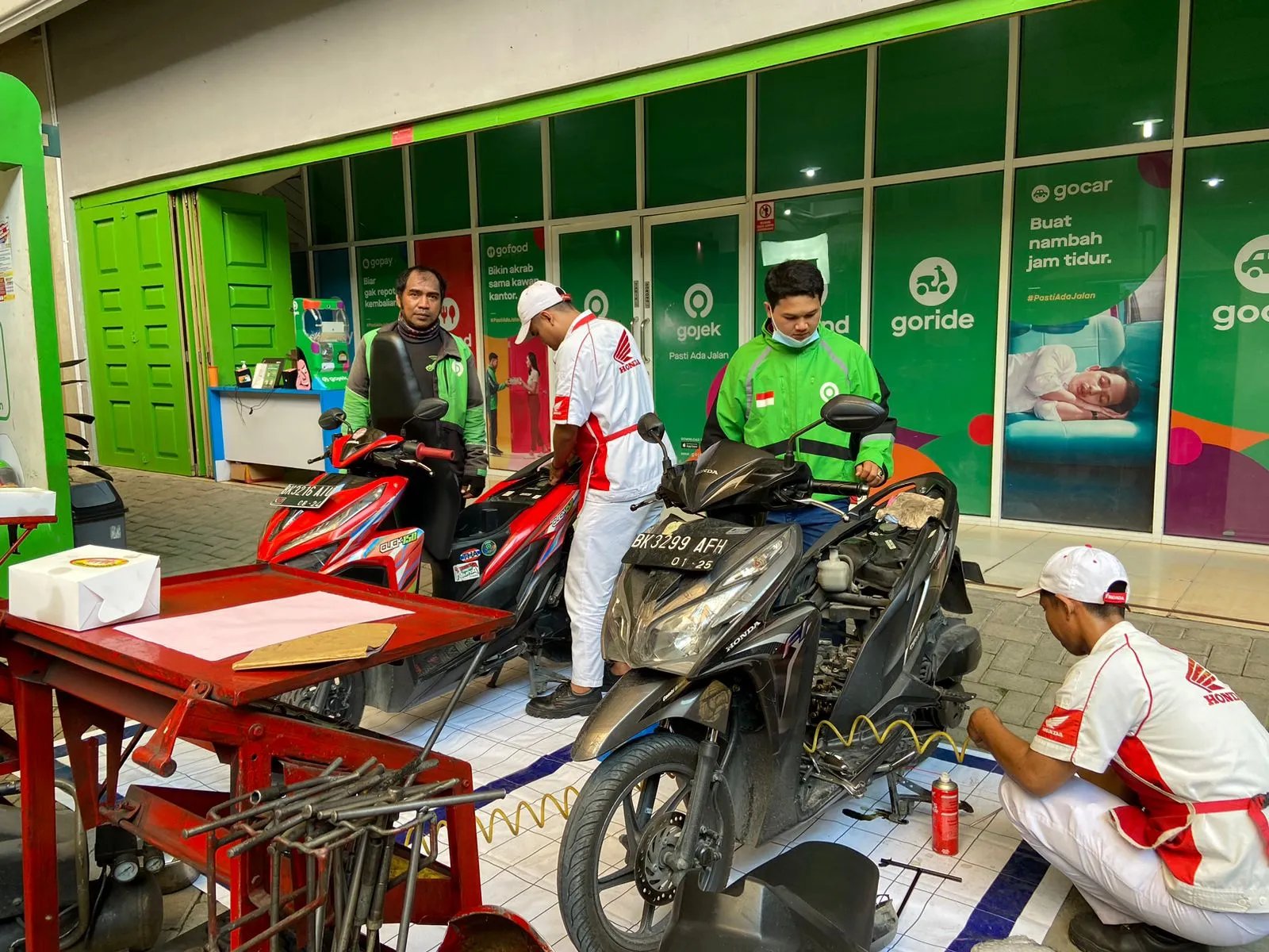 Bantu Mitra Driver, Gojek Gandeng AHASS