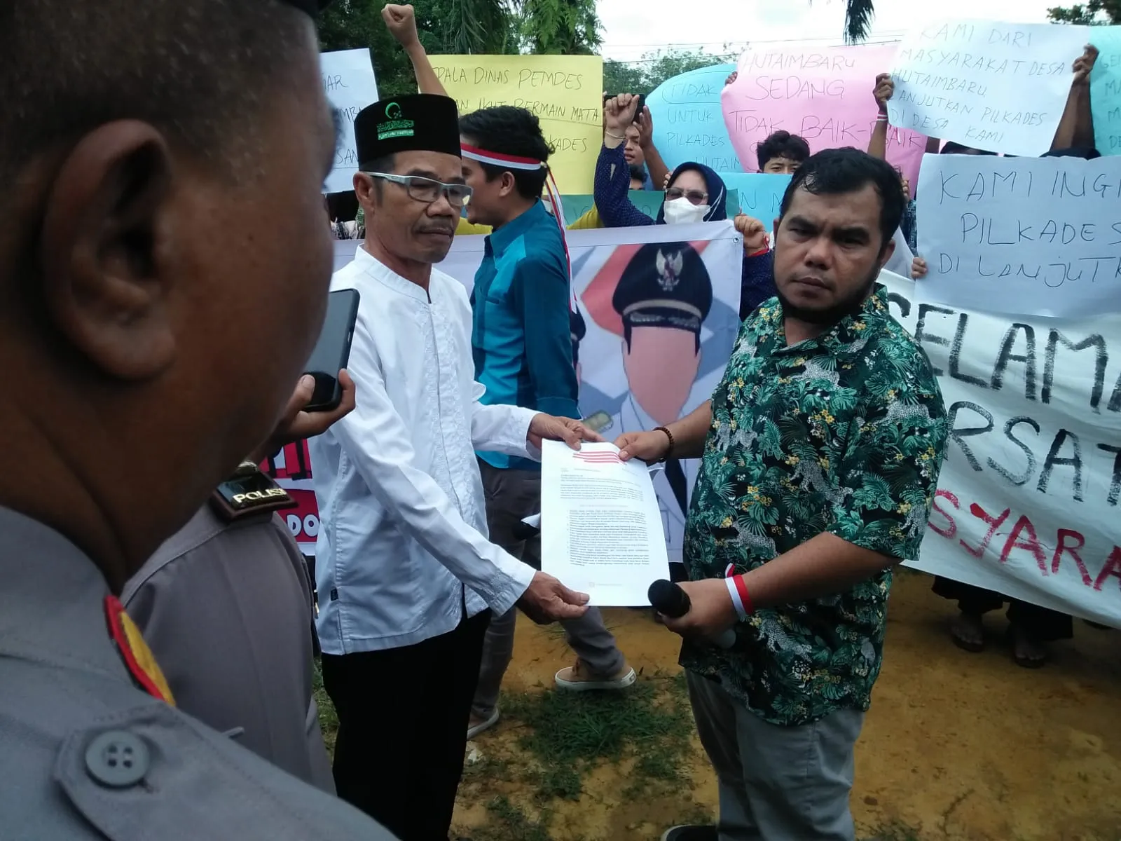 Aksi Damai Pemilihan Kepala desa Hutaimbaru Tertib Aman.