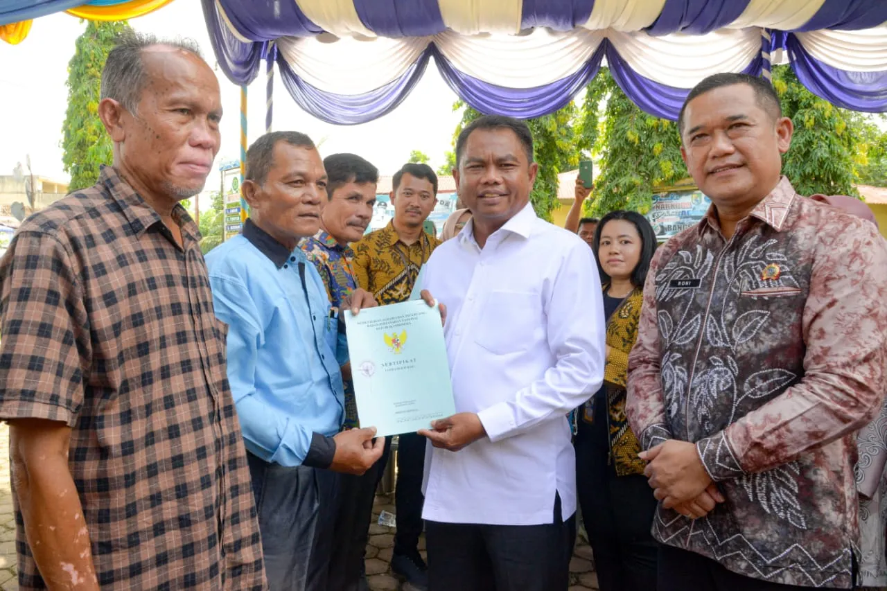 Bupati Sergai Serahkan 239 Sertifikat Tanah Gratis ke Masyarakat Dolok Masihul