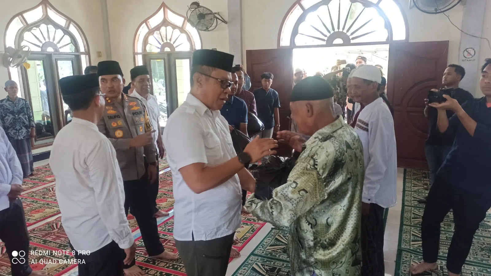 Pj Bupati & Polres Batu Bara Salurkan Bansos Ke Desa Sentang