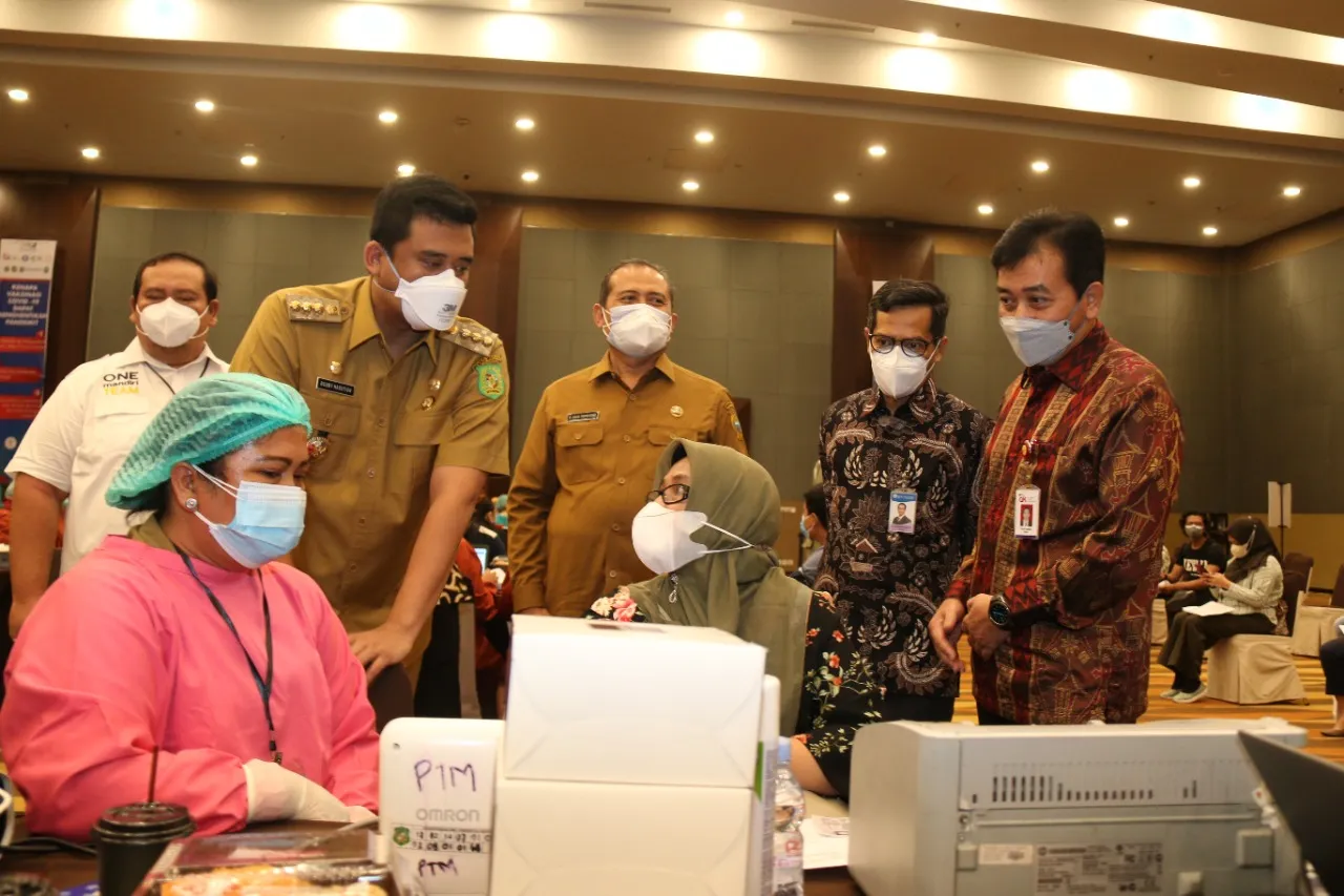 OJK, BI, Forkom IJK, BMPD Dan Dinkes Percepat Vaksinasi
