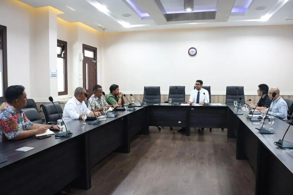 KPPU Hentikan Sementara Perkara PTPN V dengan Koperasi Sawit Makmur