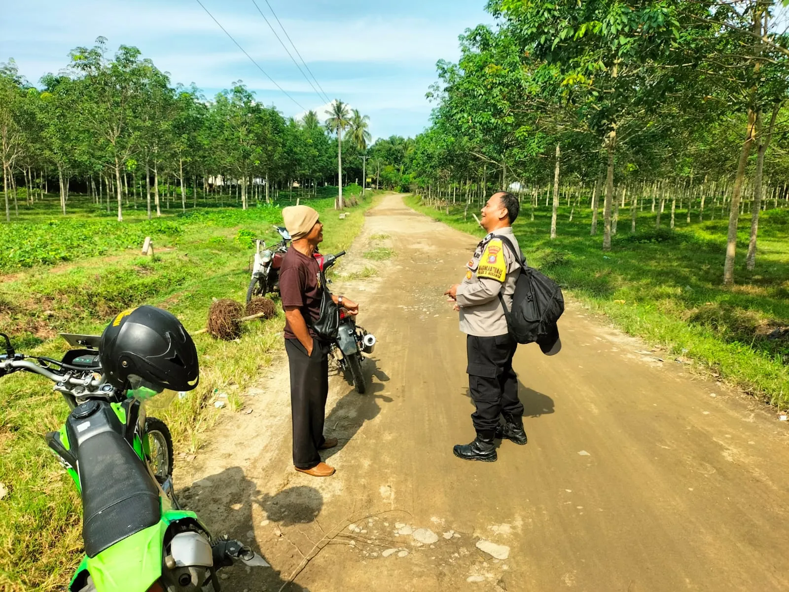 Polsek Dolok Merawan Sambangi warga Sampaikan Pesan Kamtibmas