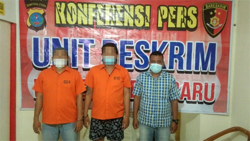 Dua pelaku penganiayaan polisi diamankan di polsek Medan Baru. beritasore/Muslim Lubis