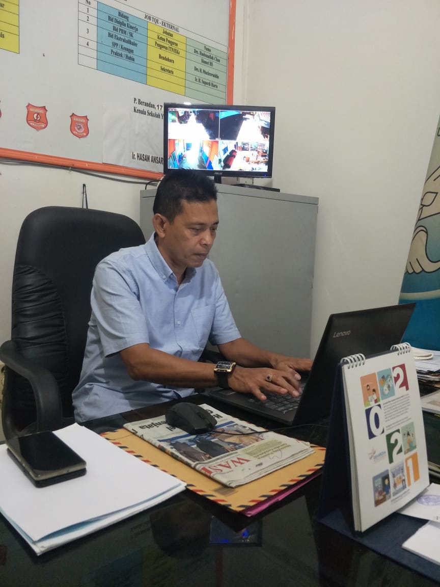 Kepala SMK TI YPT P. Brandan Ir Hasan Ansari. beritasore/Boy Aprizal