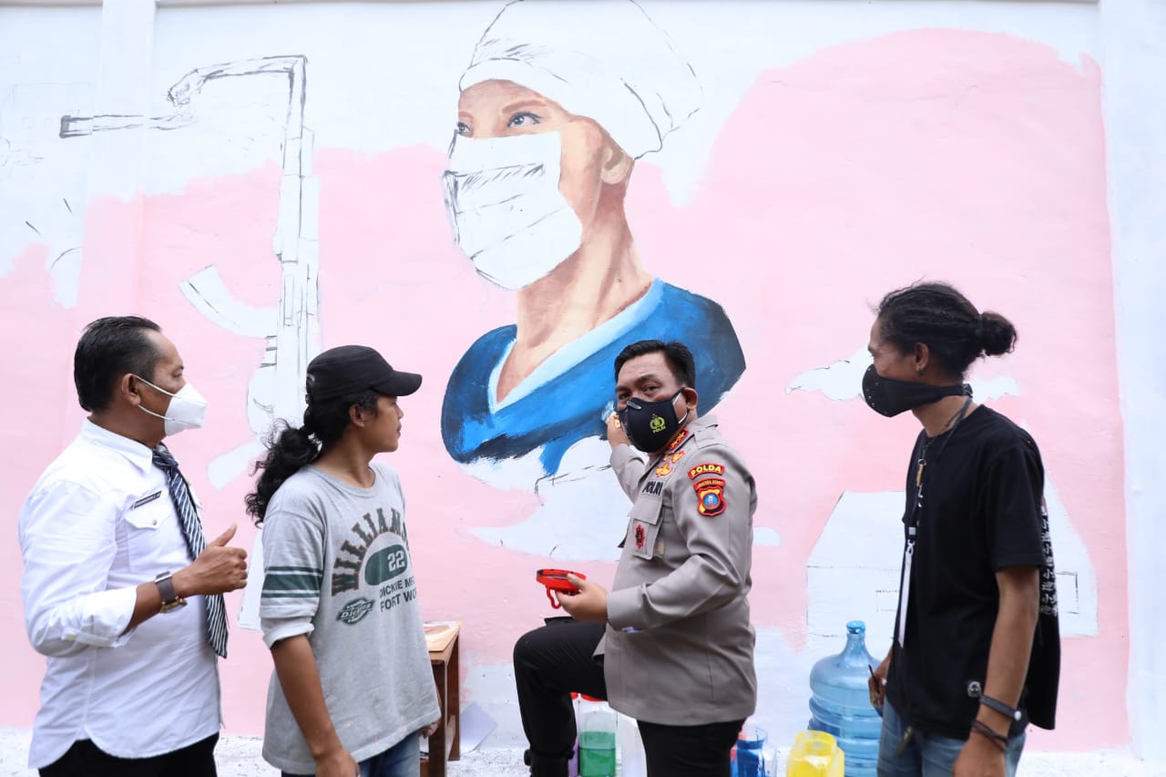 Polda Sumut Gelar Bhayangkara Mural Festival 2021, Sabtu (30/10/2021).beritasore/Alirsyah