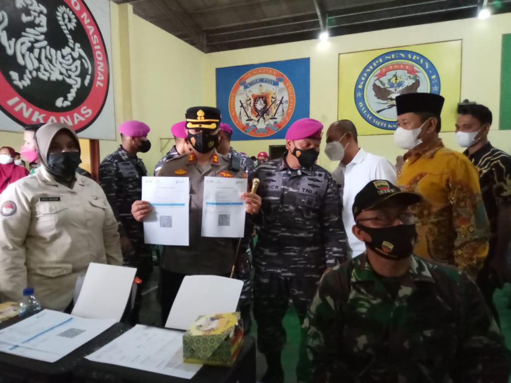 Vaksin massal di Mako Batalyon 8 Marinir Tangkahan Lagan Kecamatan Sei Lepan, Langkat, Jum'at (12/11/2021). beritasore/ist