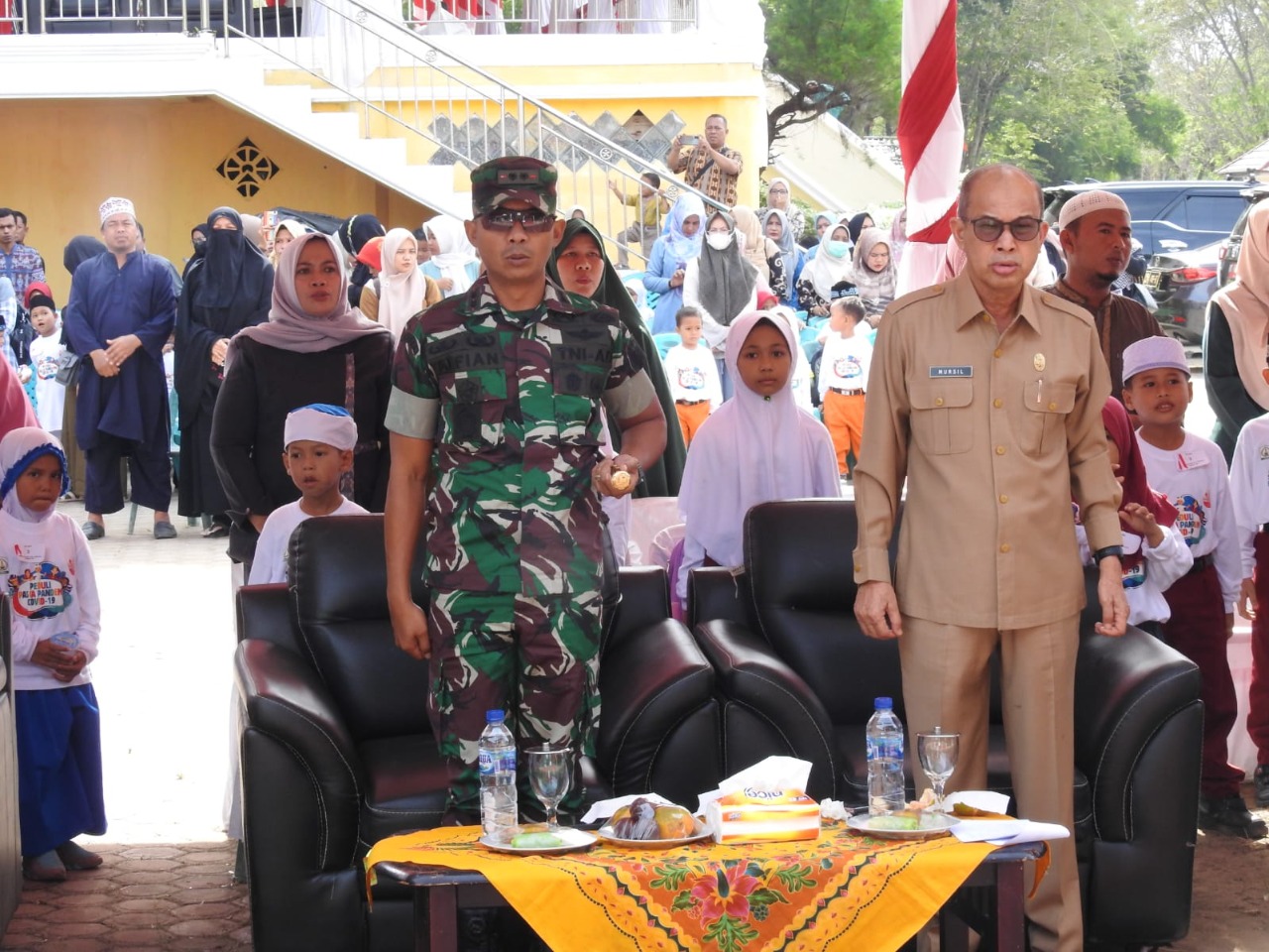 Dandim Aceh Tamiang Letkol CZI Alfian Rachmad Purnamasidi saat mengikuti kegiatan peringatan Hari Anak Nasional Tahun 2022, di tribun Kantor Bupati Kabupaten Aceh Tamiang, Selasa (16/8).beritasore/Ist