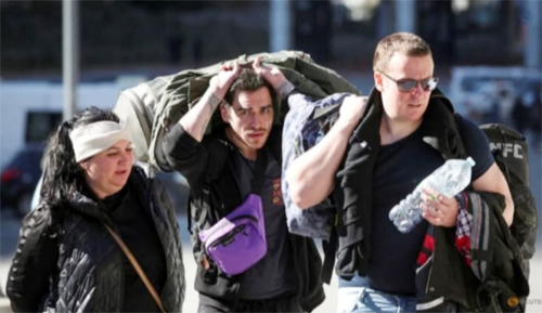 Teks Foto : Pelancong dari Rusia melintasi perbatasan ke Georgia di stasiun Zemo Larsi/Verkhny Lars, Georgia, pada 26 September 2022. (rtr)