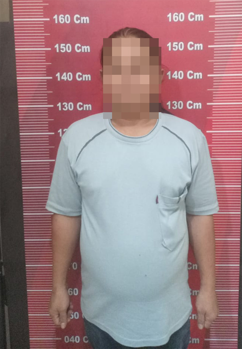 Pelaku di duga  sebagai pemalak saat di amankan di Polsek Medan Baru.beritasore/ist