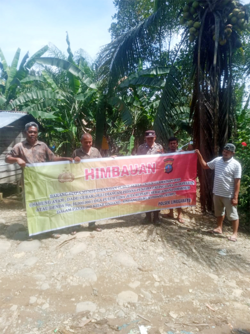 Masyarakat mengimbau tidak terlibat perjudian dengan ancaman pidana. Imbauan ini dari Polsek Linggabayu. Beritasore/ist