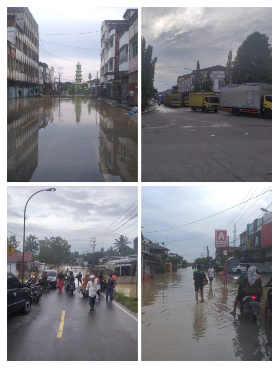 Antrian kendaraan truck dan mobil pribadi dari arah Kualasimpang, Aceh yang terjebak banjir dan tidak dapat melintas menuju Sumatera Utara dikarenakan air banjir menggenangi badan jalan dikawasan Bukit Rata, Kejuruan Muda. beritasore/ist