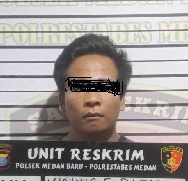 Teks.MP pelaku percobaan pencurian sepeda motor saat berada di Polsek Medan Baru