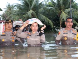 Kapolres Batu Bara Mengevakuasi & Memberika Bantuan Korban Banjir