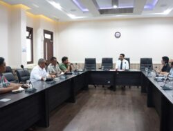 KPPU Hentikan Sementara Perkara PTPN V dengan Koperasi Sawit Makmur