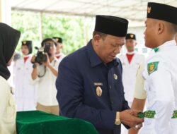 Syah Afandin Kukuhkan Paskibraka Langkat