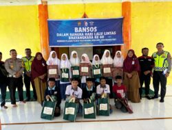 Satlantas Polres Nagan Raya Berikan Bansos Ke SMPS Dihari Lalu Lintas Bhayangkara ke 68