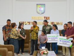 Bupati Sergai Serahkan Santunan JKM BPJS Tk ke Ahli Waris Guru SM