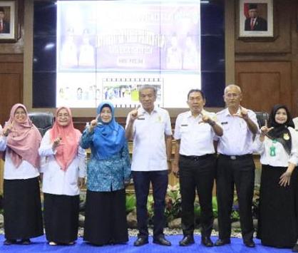 Teks foto : Sekdako Binjai H.Irwansyah Nst saat meresmikan Sosialisasi ILP. ( Berita Sore/Ist)