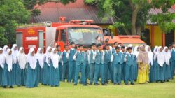 Teks foto : Apel kesiapsiagaan memperingati Hari Kesiapsiagan Bencana (HKB) Tahun 2025 di Lapangan SMP Negeri 4 Percontohan Karang Baru, Sabtu (26/4/2025).
