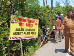 Protes Parit Isolasi PTPN IV, Puluhan Warga Aceh Tamiang Pasang Spanduk