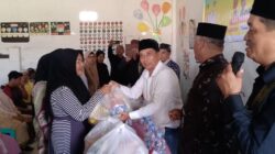 Teks fhoto, Memperingati Hari Jadi Kabupaten Batubara Ke-19, Pengurus Besar Gerakan Masyarakat Batubara (PB Gemkara) menggelar kegiatan sosial penyaluran bantuan sembako dan tali asih kepada para keluarga pejuang yang telah berkontribusi dalam proses pemekaran Kabupaten Batubara di Yayasan Husnul Khotimah, Kecamatan Tanjung Tiram, Sabtu (6/12/2025).