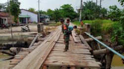 Teks fhoto Sinergi Pemkab Batubara Dan Kodam I/BB Bangun Jembatan Bailey di Desa Sei Buah Keras Kecamatan Medang Deras Rabu (18/2/2026).beritasore/alirsyah
