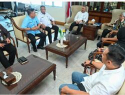 Pj Sekdaprov Sumut Terima Laporan Kinerja Komisi Informasi Tahun 2025