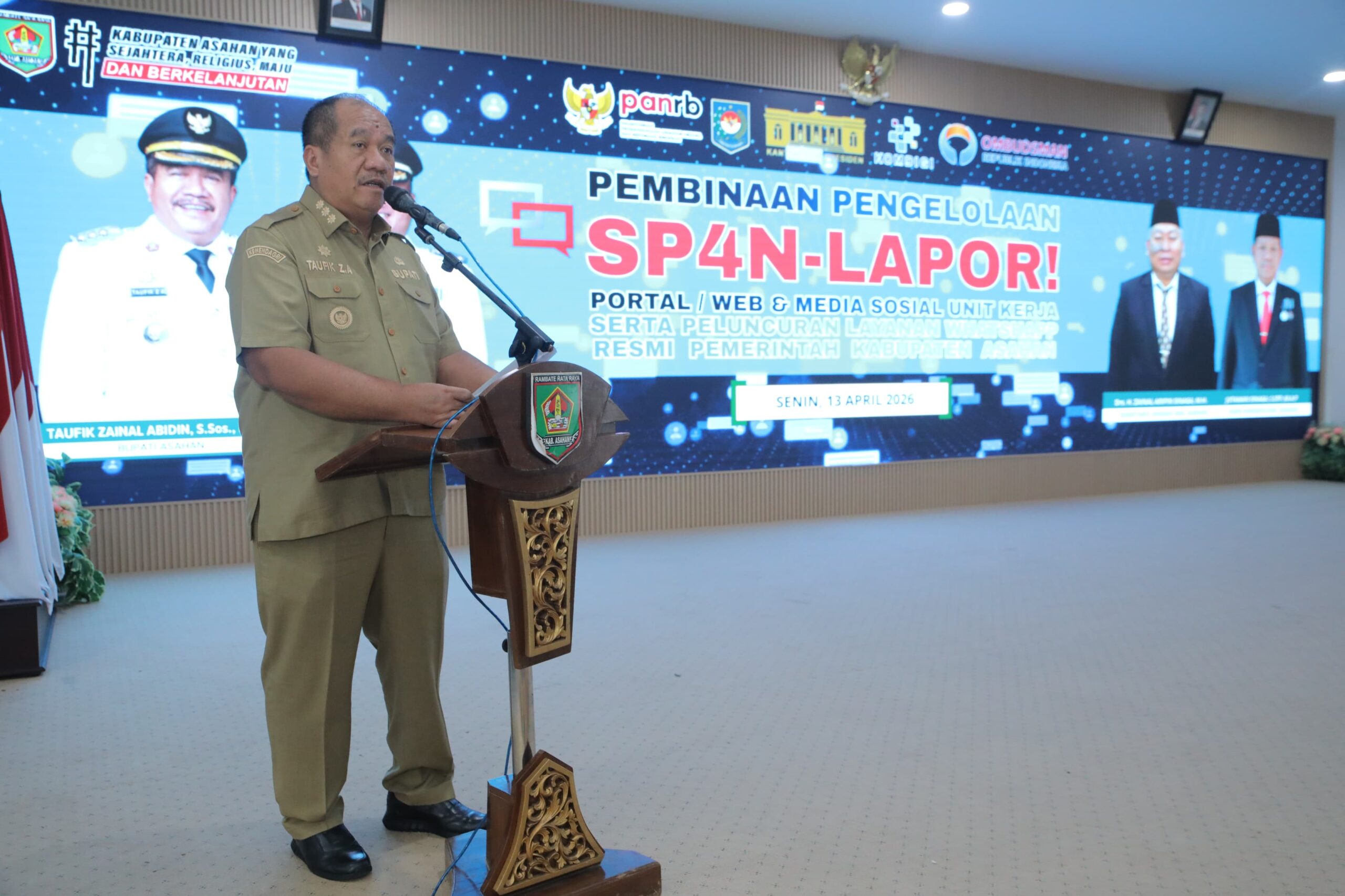 Teks fhoto Bupati Asahan Taufik Zainal Abidin, S.Sos, M.Si menggelar SP4N-LAPOR WhatsApp Resmi di Aula Melati Kantor Bupati Asahan Senin (13/4-2026). beritasore/alirsyah